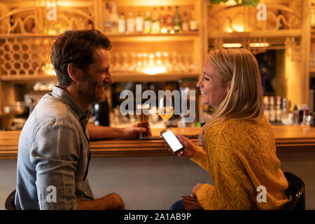 Young couple in a bar Stock Photo