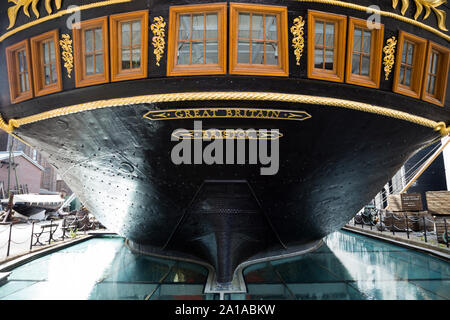 Stern / rear / back of the SS Great Britain, Isambard Kingdom Brunel 's iron ship, and the glass sea of the dry dock, Dockyard Museum in Bristol. UK. (109) Stock Photo