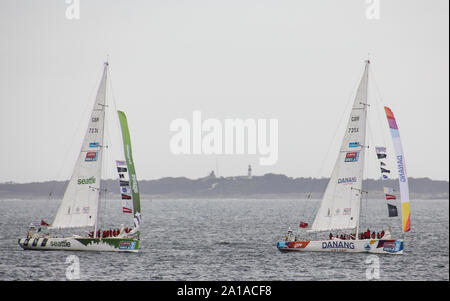 Round the world Clipper yacht race 15/16 with two yachts Danang Vietnam in front and Visit Seattle behind as they enter Cape Town harbour,South Africa Stock Photo