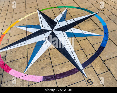 Points of the compass painted on city pavement - Vienna, Austria. Stock Photo