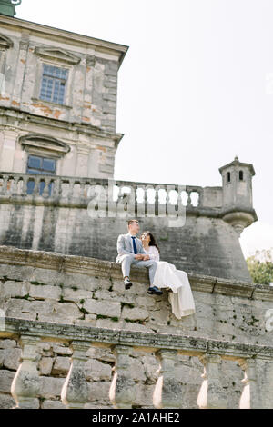 Asian bride poses for wedding photograph in the English Cotswold village of  Bibury Gloucestershire Stock Photo - Alamy