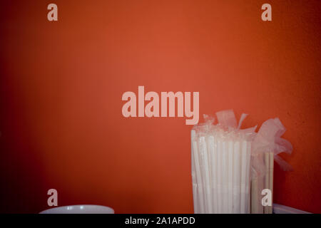 The drinking straws for the color background. Abstract a colorful of plastic straws used for drinking water or soft drinks. Selective focus. Copy spac Stock Photo