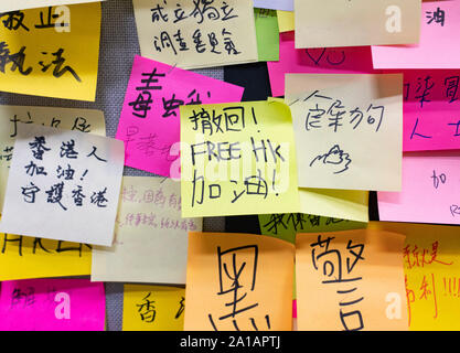 Pro democracy and anti extradition law protests, slogans and posters on Lennon Walls in Hong Kong. Pic Lennon Wall protest notes at City University of Hong Kong. Stock Photo