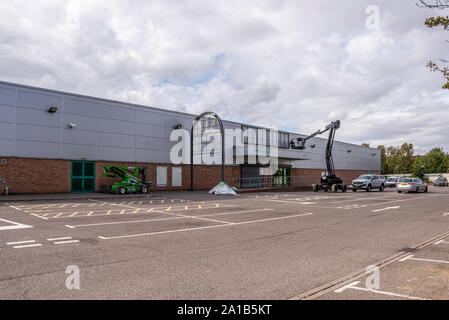 Name banner being removed from Homebase store in Southend on Sea, Essex, UK on the day of branch closure. Do it yourself warehouse closed down Stock Photo