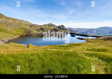 Looking down on Llyn Stwlan, a pump storage reservoir high on the side of the Moelwyns, Snowdonia Stock Photo
