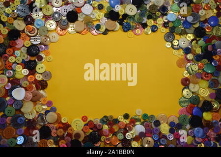 coloured mix of buttons of different size and shape Stock Photo