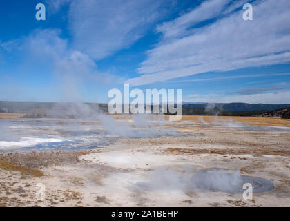 Hot springs steaming, Midway Geyser Basin, Yellowstone National Park, Wyoming, USA