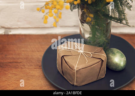 Easter yellow mimosa egg background Stock Photo