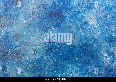 Abstract rough textured concrete wall pained with blue and navy acrylic Stock Photo