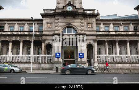 Dublin, Ireland - February 12, 2019: Street atmosphere and architecture before the DART Connolly train station in the city center on a winter day Stock Photo