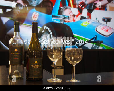 Andretti Winery wine display with video imagery of Mario Andretti in background at the Indianapolis Motor Speedway Museum, Indiana, July 28, 2019, © K Stock Photo