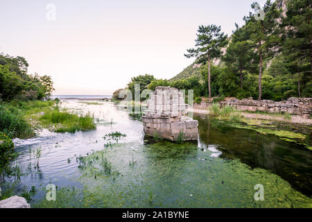 View on the ancient ruins of Lycian town of Olympos, Turkey. Stock Photo