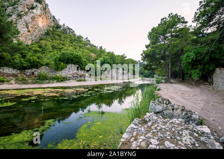 View on the ancient ruins of Lycian town of Olympos, Turkey. Stock Photo