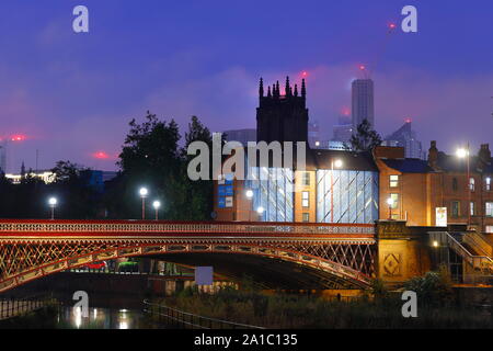 A view of Leeds from Leeds Dock early morning. Altus House is Yorkshire's tallest building and can be seen just behind Leeds Minster Stock Photo