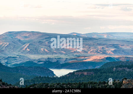 Aerial view of mountains from Canyon Rim trail overlook near campground in Flaming Gorge Utah National Park with Green River at sunset Stock Photo