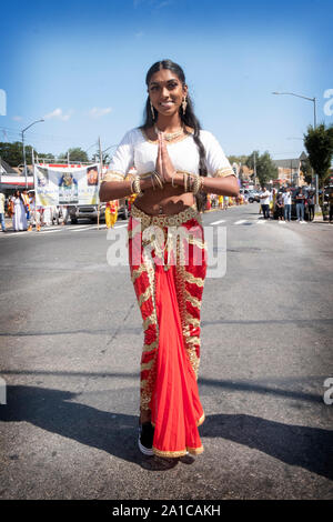 A beautiful young Hindu dancer pauses for a portrait at the Madrassi Parade for unity in the community. In Richmond Hill, Queens. Stock Photo