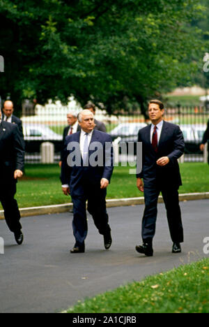 Washington DC, USA, June 23, 1994  United States Vice-President Albert Gore Jr (R) accompanies Russian Prime Minister Viktor Chernomyrdin (C) from the Blair House down the driveway towards the White House West Wing entrance for their meeting in the Oval Office with President Clinton Stock Photo