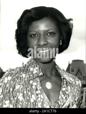 Sep. 29, 1976 - London, England, United Kingdom - NATALIE COLE, 26, is in London to make her British concert debut. Natalie, winner of two Grammies at the 1976 Awards presentations, including Best New Artist of the Year, recently completed a highly successful tour of Japan, which included a prize-winning appearance at the Tokyo Music Festival. She will make her first concert appearance at the New Victoria Theatre in London on Thursday September 30th. Natalie Cole holds a special cake with her name on it, baked for her by a chef at Crockfords where there was a reception today. (Credit Image: © Stock Photo