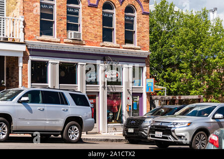 Park City, USA - July 25, 2019: Ski resort town in Utah during summer with downtown historic buildings sports store shop and cars Stock Photo