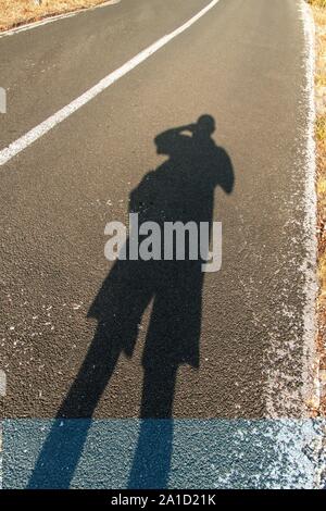 Shadow of a man on the ground texture Stock Photo - Alamy