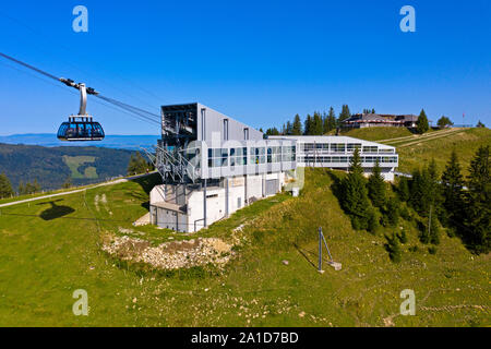 Cable car leaving for the Moleson summit from the Plan-Francey intermediate station, Moleson-sur-Gruyeres, canton of Fribourg, Switzerland Stock Photo