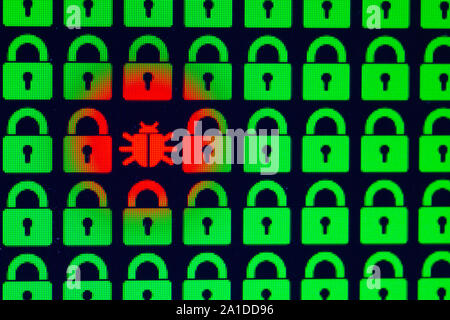 Bug as a symbol of malware and a Trojan virus in the program code. Hacking and theft of personal information and data. Green pixel locks and red Bug on a black background, close-up. Stock Photo