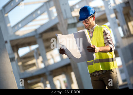 Engineers working on a building site Stock Photo