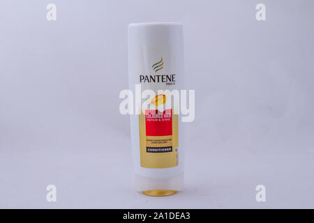 Alberton, South Africa - a bottle of Pantene Pro-V hair conditioner isolated on a clear background image with copy space in horizontal format Stock Photo