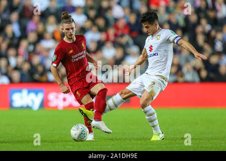 Harvey Elliott of Liverpool and George Williams of Milton Keynes Dons during the Carabao Cup match between MK Dons and Liverpool at stadium:mk, Milton Keynes, England on 25 September 2019. Photo by David Horn. Stock Photo