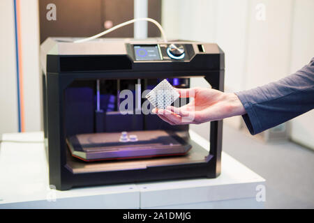 A desktop 3d printer in the laboratory for prints a structure from a polymer Stock Photo