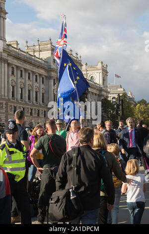 Westminster, London, UK. 25 September 2019. Remain and leave protesters demonstrate outside the House of Parliament.  MPs return to Parliament the day after the Supreme Court declared that Boris Johnson proroguing of Parliament was unlawful.  MPs debate in the House the outcome of the Supreme Court decision and the Prime Minister Boris Johnson faces questions from MPs. Stock Photo