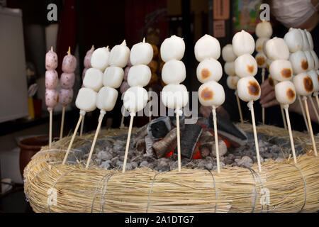 Dango or Japanese dumpling and sweet made from mochiko for sale travelers in Naritasan Omote Sando or Narita old town at Chiba Prefecture on March 31, Stock Photo