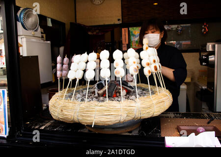 Dango or Japanese dumpling and sweet made from mochiko for sale travelers in Naritasan Omote Sando or Narita old town at Chiba Prefecture on March 31, Stock Photo