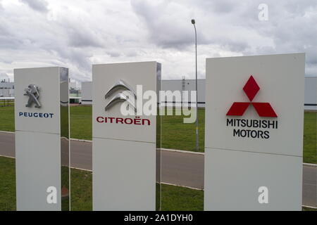 Russia. 24th Sep, 2019. KALUGA REGION, RUSSIA - SEPTEMBER 24, 2019: Signs outside the PCMA Rus car plant in Rosva Industrial Park in Kaluga Region, Russia; the car factory was inaugurated as a joint project by PSA Peugeot Citroen and Mitsubishi Motors Corporation in 2009, currently it has the production capacity of 125,000 vehicles per year and manufactures the Pajero Sport and SUV Outlander for the Mitsubishi Motors Corporation, and a number of vehicles for the PSA Group. Sergei Bobylev/TASS Credit: ITAR-TASS News Agency/Alamy Live News
