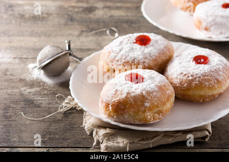 Hanukkah sufganiyot. Traditional Jewish donuts for Hanukkah. Stock Photo