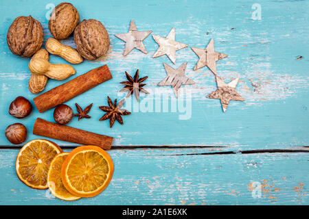 Background with ingredients for Gingerbread or wassail on blue wooden table Stock Photo