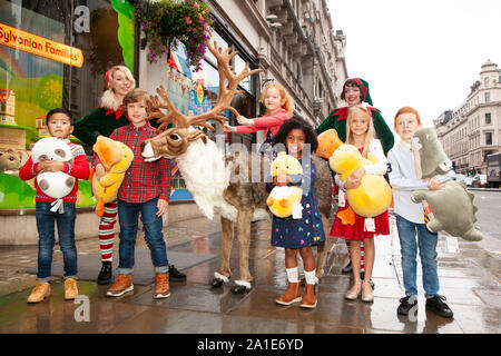 A few lucky children got a trip to Hamleys for the launch of their 10 Toys For Christmas on Regent Street. Stock Photo
