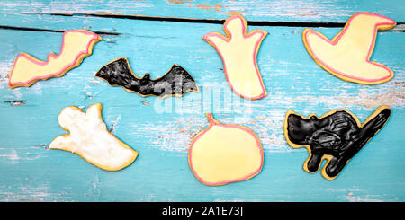Cookies with different halloween shaping on blue wooden table with shabby chic Stock Photo