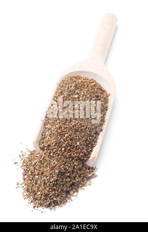Crushed Coriander Seeds On A Wooden Shovel Isolated On White Stock Photo