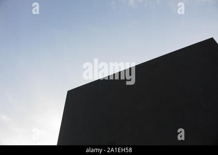 LED display on the background sky in the evening. Black LED monitor is turned off and the sky as a background. Stock Photo