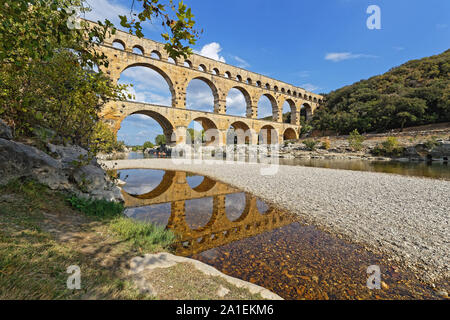 REMOULINS, FRANCE, SEPTEMBER 20, 2019 : The Pont du Gard, the highest Roman aqueduct bridge, and one of the most preserved, was built in the 1st centu Stock Photo