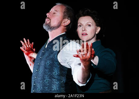 Chichester Festival Theatre, UK. 26th Sep, 2019. John Simm and Dervla Kirwan perform as Macbeth and Lady Macbeth during a photo-call for Chichester Festival Theatre's production of William Shakespeare's 'MacBeth', directed by Paul Miller, at the Chichester Festival Theatre, Chichester, UK, Thursday September 26, 2019. Photograph Credit: Luke MacGregor/Alamy Live News Stock Photo