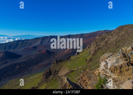 Haleakala volcano crater on a sunny day with a wileknian sea in the image background. Photographed on the Haleakala on Maui Hawaii Stock Photo