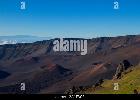 Haleakala volcano crater on a sunny day with a wileknian sea in the image background. Photographed on the Haleakala on Maui Hawaii Stock Photo