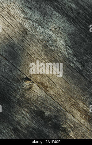 Grunge worn wooden surface texture with shadow pattern from above Stock Photo