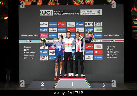 Italy's Alessio Martinelli (silver) USA's Quinn Simmons (gold) and USA's Magnus Sheffield (Bronze) on the podium after the race during the Men's Junior Road Race from Richmond to Harrogate. Stock Photo