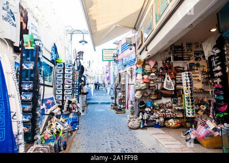 SANTORINI, GREECE - APRIL, 2018: Stores at Perissa beach in Santorini Island Stock Photo