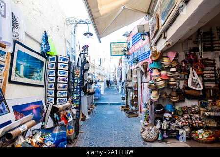 SANTORINI, GREECE - APRIL, 2018: Stores at Perissa beach in Santorini Island Stock Photo