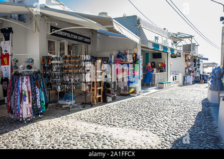 SANTORINI, GREECE - APRIL, 2018: Stores at Perissa beach in Santorini Island Stock Photo