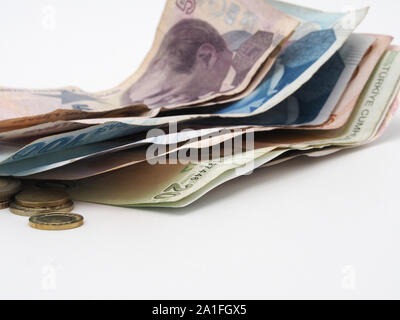 Turkish liras on bills and coins with background white Stock Photo